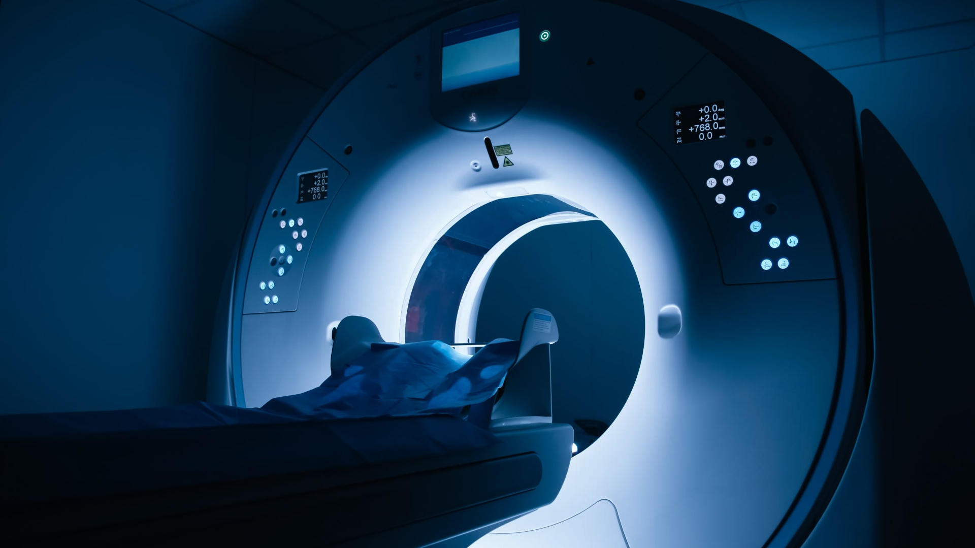 Imaging & MRI referral pathway in Reading — Mr Sam Nahas MRI scanner in a hospital imaging suite, view of the gantry and patient table